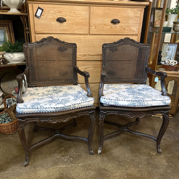Pair Caned chair with blue cushion