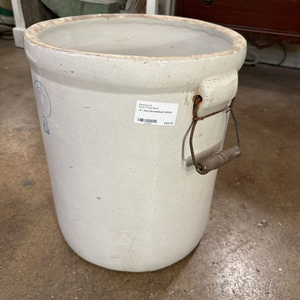 8 - GALLON HANDLED CROCK, SMALL SPIDER HAIRLINE CRACK ON BOTTOM. 16 1/4”H x 17 1/2”W WITH HANDLES, IN STORE PICKUP ONLY