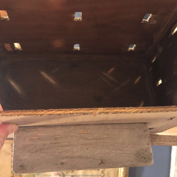 Primitive hand made house with green removable roof