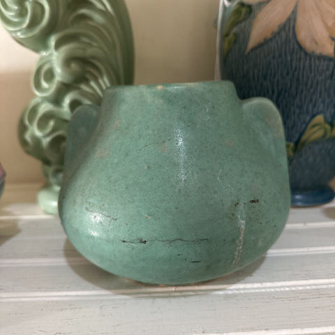 Green clay two handled vase