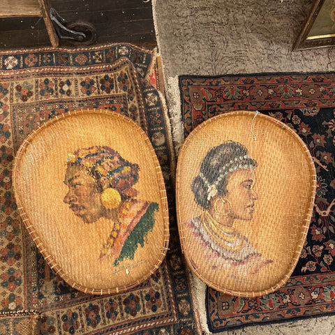 Pair of portraits on baskets