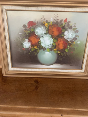 Vintage signed oil on board of red and white roses 20 x 16 inches.