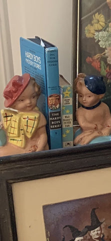 Vintage chalkware girl bookends