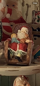 Musical Santa in rocking chair