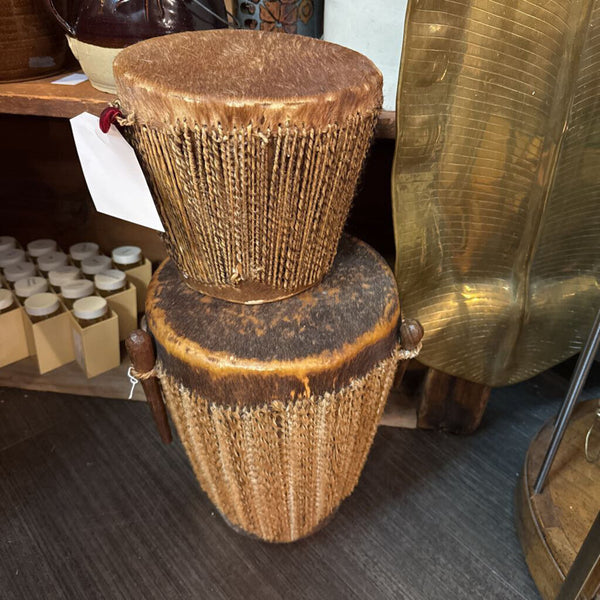 Pair of cowhide and sisal drums
