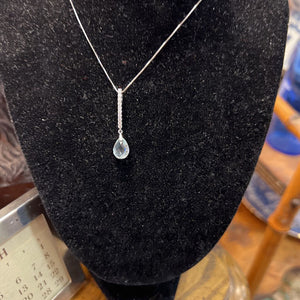 14K white gold necklace with blue topaz and diamond pendant