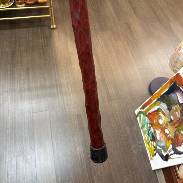 Carved wooden cane with copper wrap and buffalo nickel