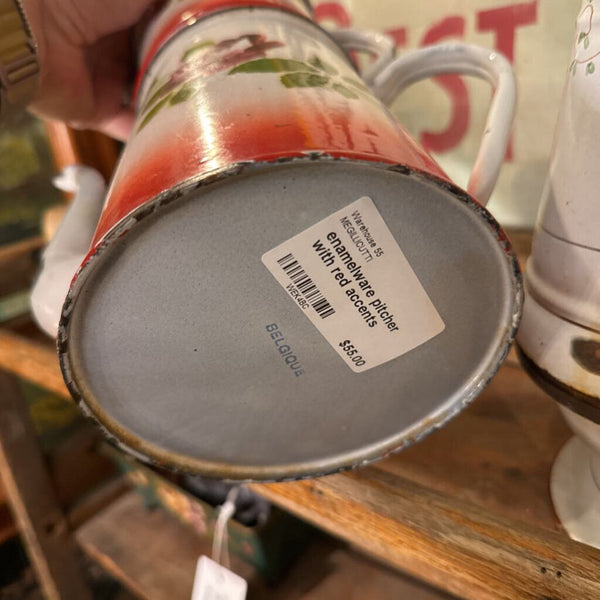enamelware pitcher with red accents