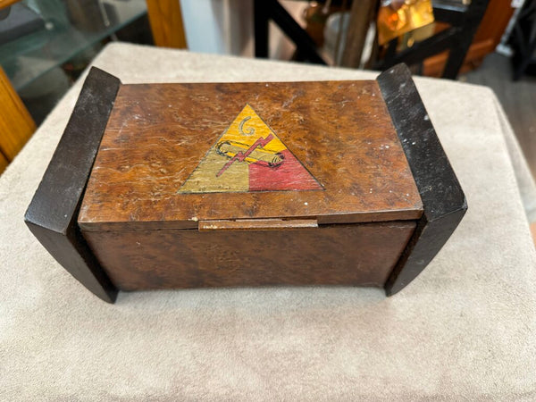 Vintage buried wood box with emblem of the 6th Tank Battalion, WWII