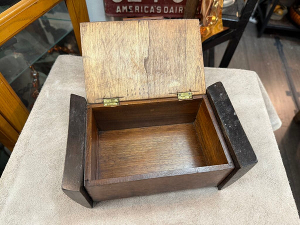 Vintage buried wood box with emblem of the 6th Tank Battalion, WWII