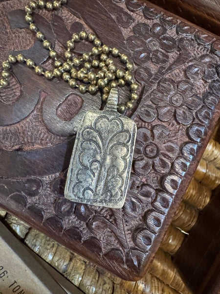 Buddha on brass chain