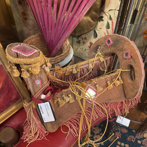 Camel saddle embellished