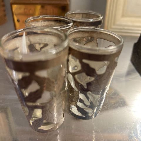 Set a four vintage Sterling silver shot glasses
