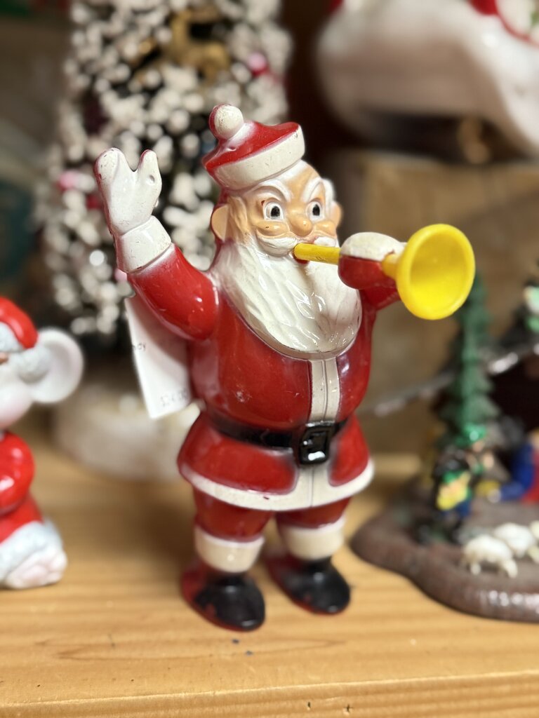 Santa holding horn candy container
