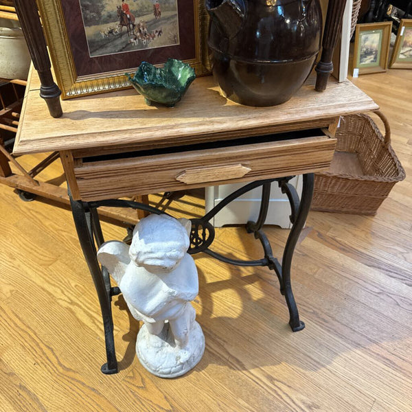 Side table reimagined from salvage iron base and wood top d/ w drawer and shelf