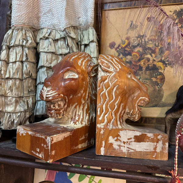 carved lion head bookends made in Spain