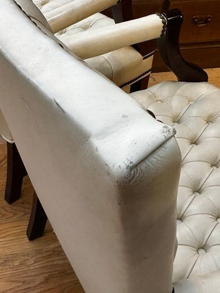 PAIR OF JASPER SEATING ANALINE-DYED WHITE LEATHER AND WOOD TUFTED ARMCHAIRS WITH BRASS NAILHEAD TRIM, AS FOUND. 35"H x 27"D x 24"W. IN STORE PICKUP.