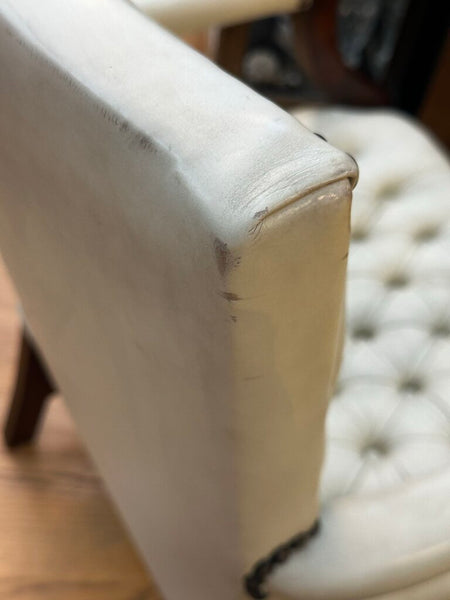 PAIR OF JASPER SEATING ANALINE-DYED WHITE LEATHER AND WOOD TUFTED ARMCHAIRS WITH BRASS NAILHEAD TRIM, AS FOUND. 35"H x 27"D x 24"W. IN STORE PICKUP.