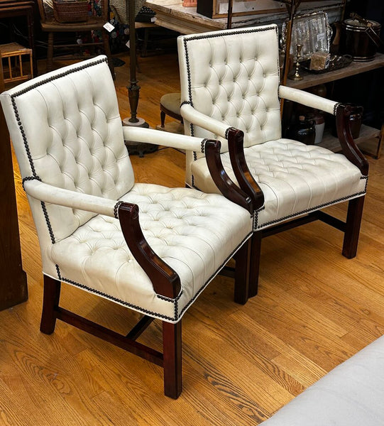 PAIR OF JASPER SEATING ANALINE-DYED WHITE LEATHER AND WOOD TUFTED ARMCHAIRS WITH BRASS NAILHEAD TRIM, AS FOUND. 35"H x 27"D x 24"W. IN STORE PICKUP.