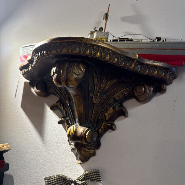 Pair of gilded wall shelves