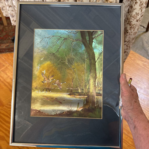 Duck art framed in chrome frame (dimensional effect as if color changes)