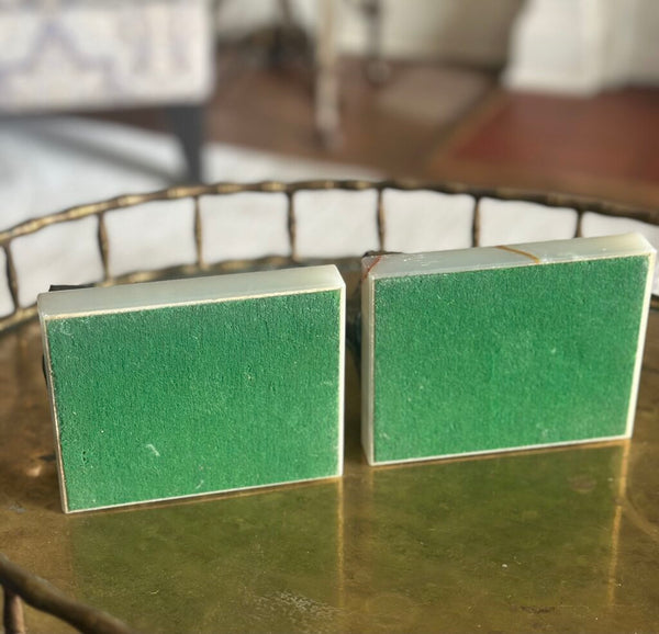 PAIR OF “BOOKISH” BOOKENDS ON MARBLE BASES. EACH BOOKEND IS 6"H x 5"W x 4"H