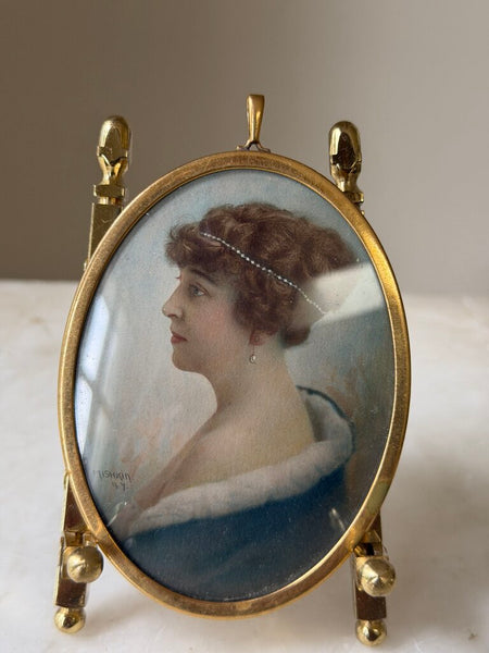 Hand Colored Photograph in Oval Frame