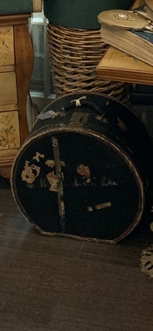 Antique black round hatbox suitcase