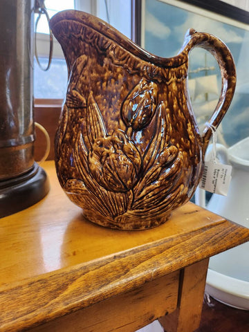Brown spongeware pitcher with tulips 8" tall